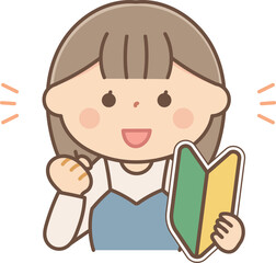 初心者マークを持ってガッツポーズをする女性