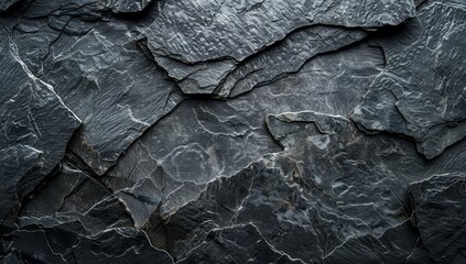 Black white stone texture. Rock surface. Close-up. Like a old rough concrete wall. Dark gray grunge background with space for design. Template. Backdrop. Wide banner.