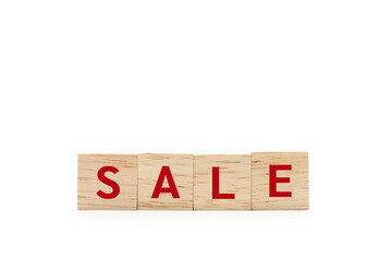 Red SALE word wooden blocks of business concept isolated on white background. Copy space and Clipping Path. Financial, Economic, Business, Marketing.