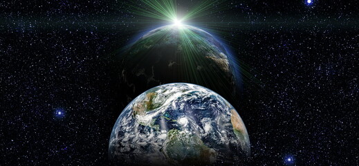 Earth and galaxies in space. Design fantasy. Blue Sunrise.Elements of this image furnished by NASA.