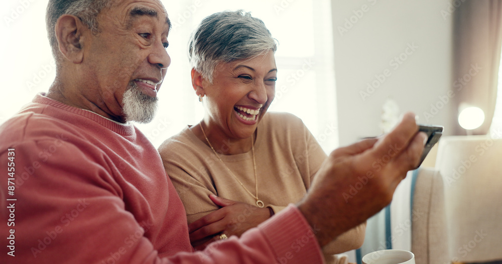 Canvas Prints Laugh, phone and senior couple in home together for funny joke, meme or reading comedy story. Retirement, man and woman on mobile in lounge for news, streaming video and relax for connection on email