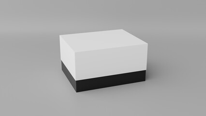 a white and black cube on a gray surface