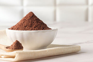 Cocoa powder in a white cup
