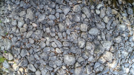 Aerial view at stone in dry river.