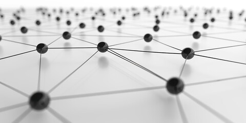 Abstract network of connected black spheres on a white surface, representing connectivity, technology, and modern communication.