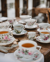 Fototapeta premium traditional tea set, tea ceremony, porcelain tea set, classic tea set, antique tea set, vintage tea set, fine china, ceramic tea set, cultural tea set, oriental tea set, tea culture, traditional tea 