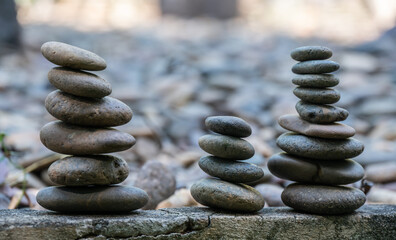 Zen balance stacked stones in Japanese garden.