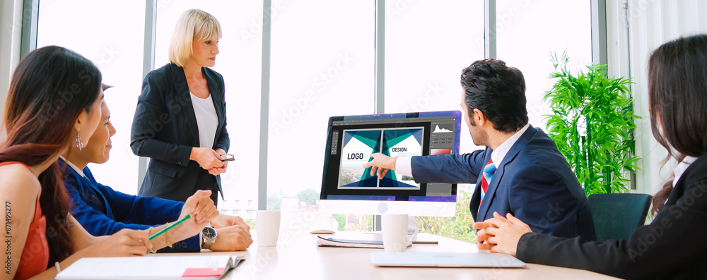 Poster graphic designer software for modern design of web page and commercial ads showing on the computer s