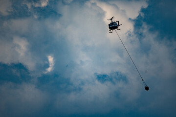 Helitak Wildfire Helicopter dropping Water on Riley Denali Wildfire