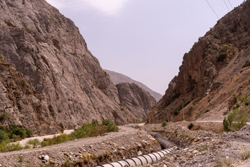 A mountain range with a river running through it