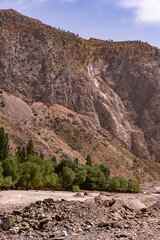 A mountain range with a rocky, barren hillside