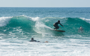 professional surfer riding waves, men catching waves in ocean, isolated. Surfing action water board sport. people water sport lessons and beach swimming activity on summer vacation