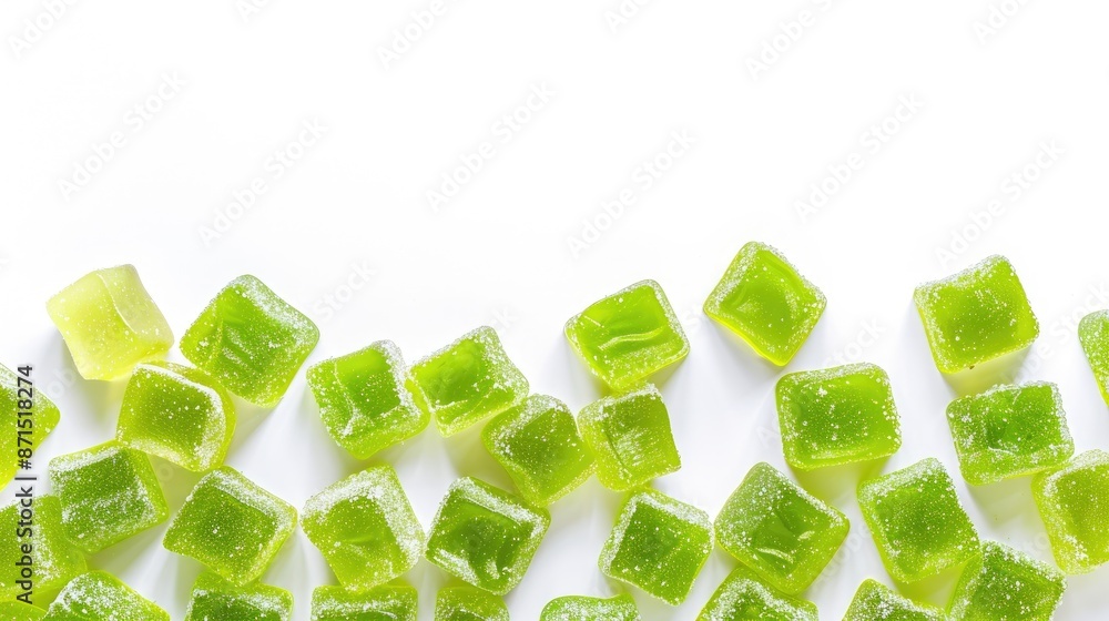 Poster assorted green gummy candies on white background top view with space for text or design