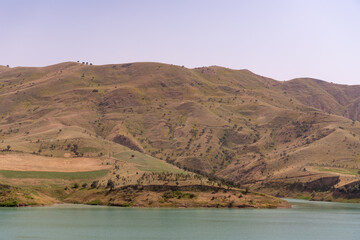 A mountain range with a river running through it