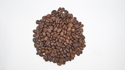 
Pile of coffee beans on a white background
