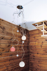 Modern lamp inside a wooden house