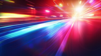 A dynamic image featuring colorful light streaks conveying a sense of high-speed motion and energy on a dark background