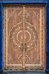 ancient carved wooden door with arabic pattern Uzbek ornament in the Museum of Victims of Political...