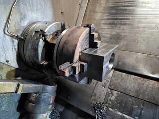 Three jaw chuck and four jaw chuck of a modern cnc lathe.