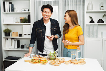 Chef influencers reading comment on phone for answering time on social media cooking show channel...