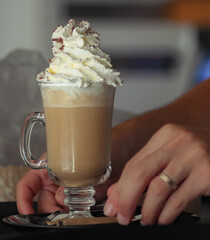 Capuccino with milk and whipped cream from Italian cafe