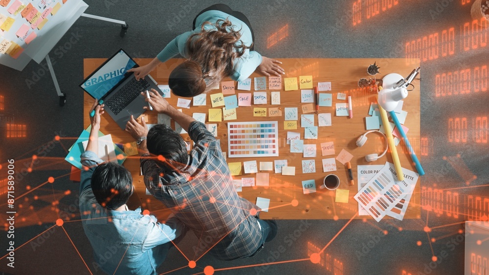 Aufkleber top down view of business team with casual outfit looking laptop screen and sharing idea. aerial vie