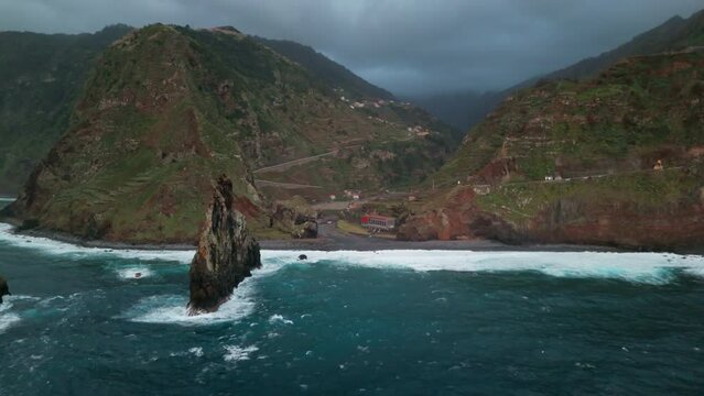 Aerial view of the Ilheus da rib arch, on the coastline of Ribeira da Janela in Madeira, Portugal