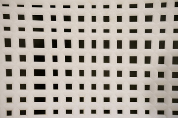 A beautifully crafted weaving pattern showcases its intricate and geometric design, blending traditional craftsmanship with modern aesthetics. The interlaced threads form a symmetrical and detailed