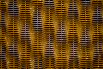 A beautifully crafted weaving pattern showcases its intricate and geometric design, blending traditional craftsmanship with modern aesthetics. The interlaced threads form a symmetrical and detailed