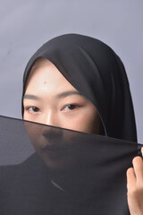 Naklejka premium Asian Hijab Woman with Face Expressions and Gestures