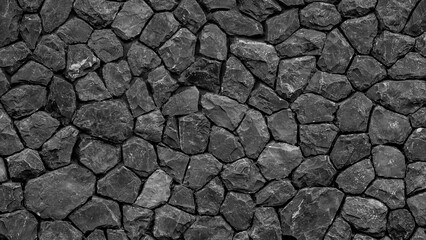 Texture of black stone wall, Old castle stone wall texture background, Black stone wall as a background or texture, Part of black stone wall for background or texture.