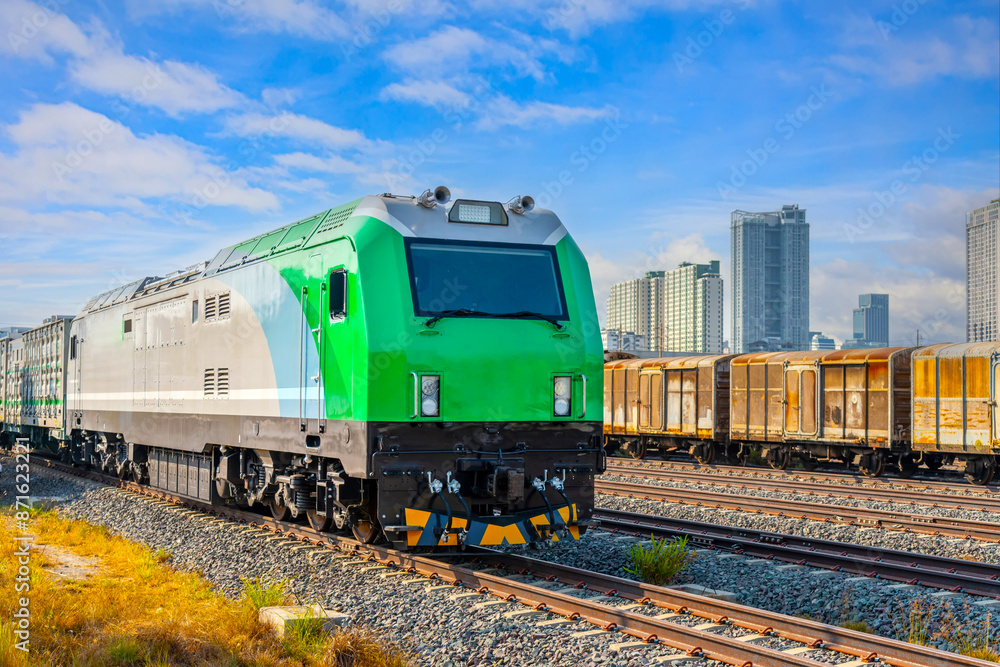 Wall mural electric locomotive freight station in the city