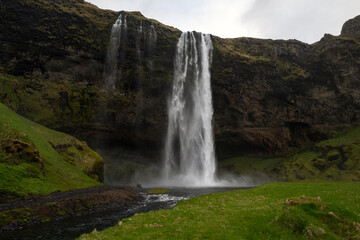 Obraz premium Seljalandsfoss waterfall on south iceland in moody weather in summer