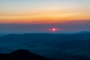 Fototapeta premium Sunrise from Cervena hora hill in Jeseniky mountains in Czech republic