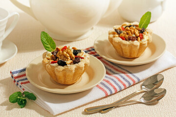 Tartlets with cheese and nuts.