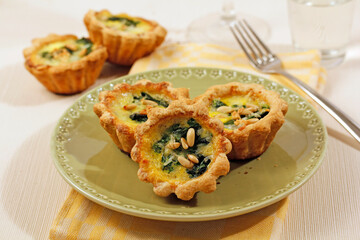 Cheese and spinach tartlets.