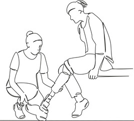 A female athlete is fitted with a prosthesis