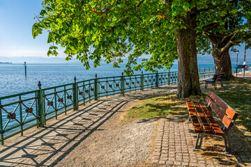 Bench at idyllic promenade in Friedrichshafen at Lake Constance in Southern Germany © Calado