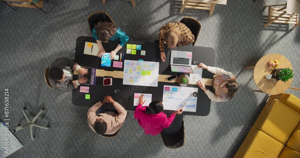 Aufkleber top down view, zoom out: diverse team of professionals in an office discussing digital strategies. b