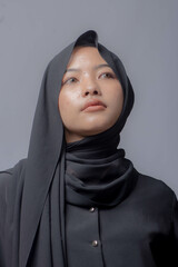 Asian Hijab Woman Wearing Black Dress