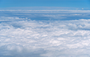 Naklejka premium Blue Sky with White Clouds, Flying above Sunny Cloudy Sky Texture Pattern, Fluffy Clouds Plane View