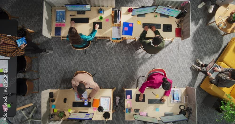 Poster top down view: multi-ethnic team of professionals working with digital projects in a corporate offic