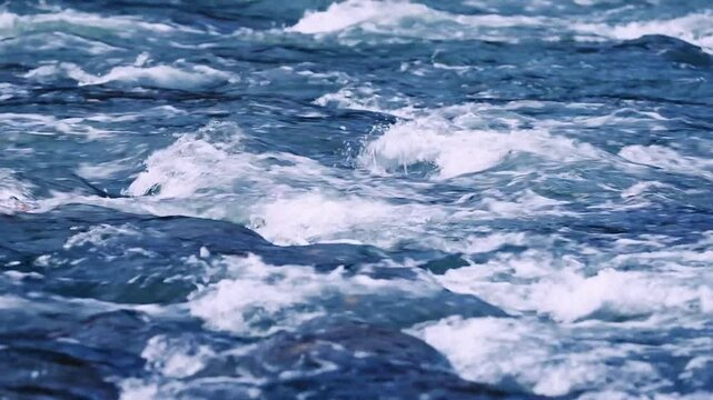 Beautiful blue waves of river