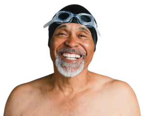Cheerful senior man wearing swimming glasses
