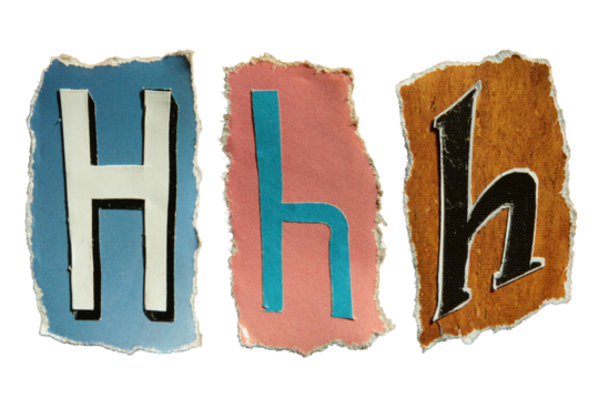 H alphabet torn from a magazine paper. Ransom note style letters.