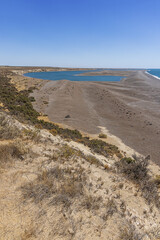 The pebble beach and the laguna at Punta Cantor the most eastern point of the Valdes peninsula
