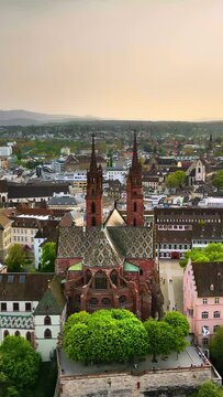 Aerial, drone view of the Basler Munster Cathedral in Basel, Switzerland. Vertical