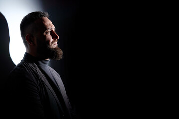 Obraz premium Studio portrait of young handsome man with beard.