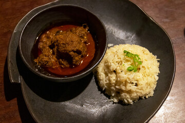 A delicious and healthy meal of beef stew and rice, made with fresh, organic ingredients.