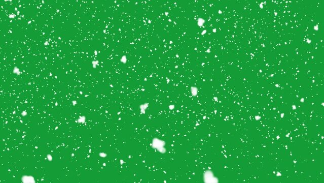 Snow falling on green background